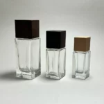تولید شیشه عطر مستطیلی و درب چوبی عطر مکعبی