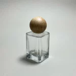شیشه فانتزی عطر و درب چوبی کروی جنس چوب راش